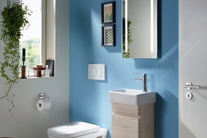  Ton-in-Ton in weiß: Die WC-Betätigungsplatte Geberit Sigma20 mit schicken Designringen fügt sich elegant ins Gäste- oder Familienbad ein. 