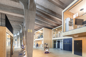  Wie einst die 34 Dampfloks wurden in dem höheren Hallenteil pro Segment zweigeschossige Holz-Raummodule eingeschoben 