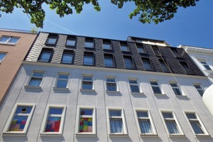  Gebäudeaufstockung mit Stahl-Leichtbaufassade in Wien. Architekten Stefan Goos  