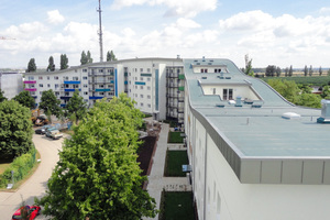   Der partielle Rückbau von Geschossen ermöglichte  Dachgeschosswohnungen in der Wernigeröder Welle  