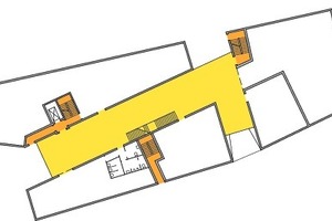  Ärztehaus Erdgeschoss: Ausgehend von der Entwurfsidee eines zentralen Foyers und dem zentralen Schutzziel „Selbstrettung“ wurden zwei bauliche Rettungswege vorgesehen 